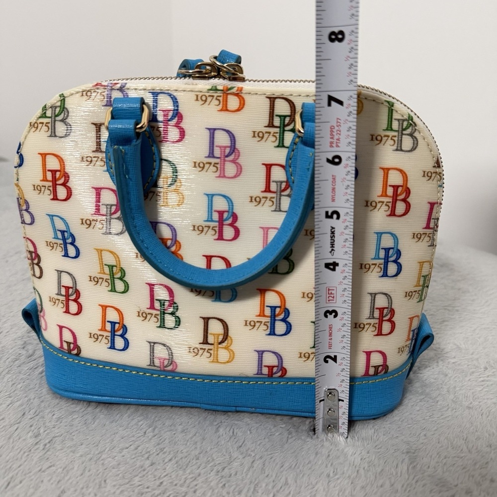 Dooney & Bourke 1975 Logo Bag Domed Crossbody Ruby Top Handle Wht/ Multi Zip Top - Picture 10 of 12